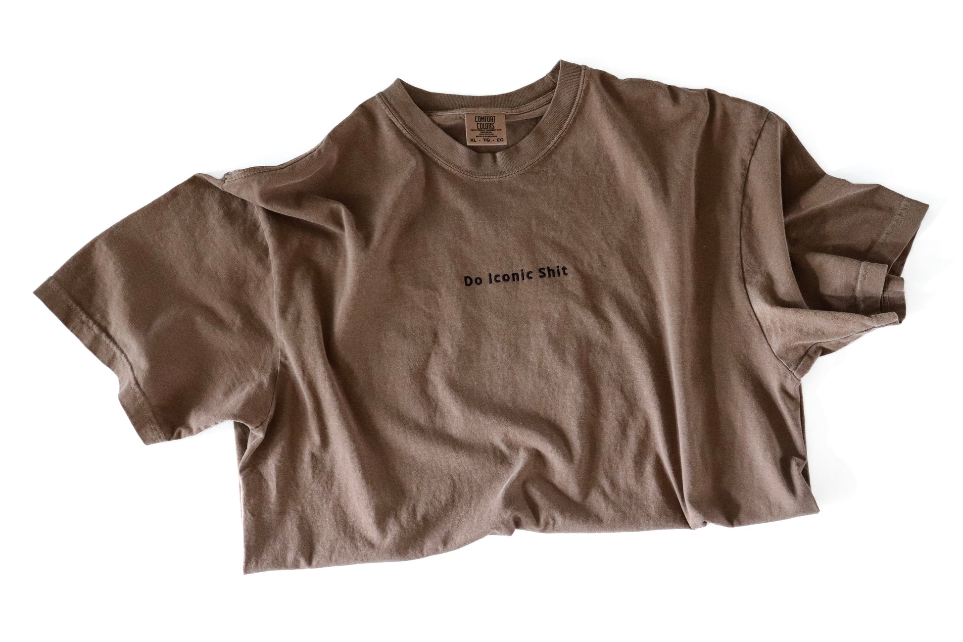 Brown t-shirt with text on a white background