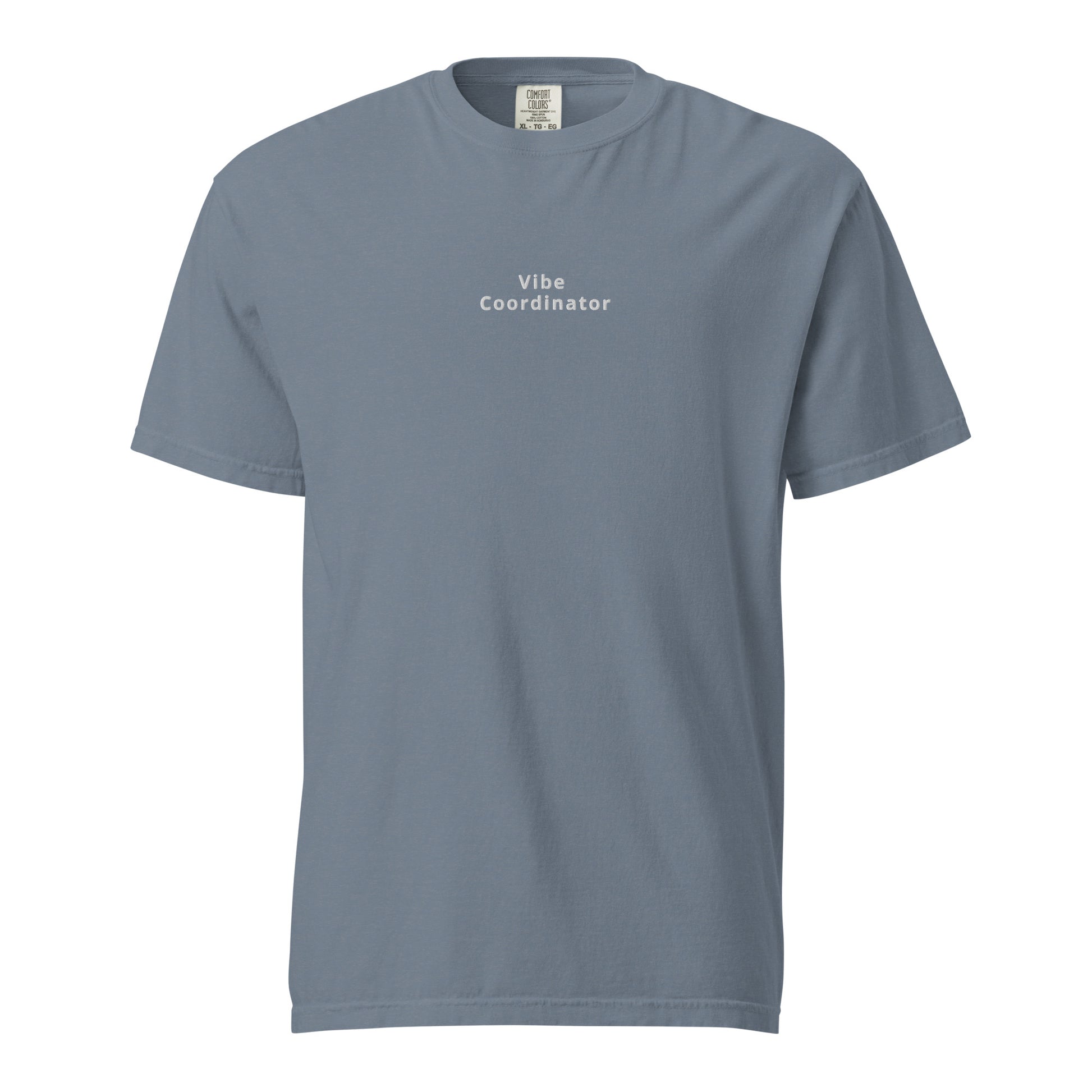 Product mockup with blue shirt and white words saying vibe coordinator on white background