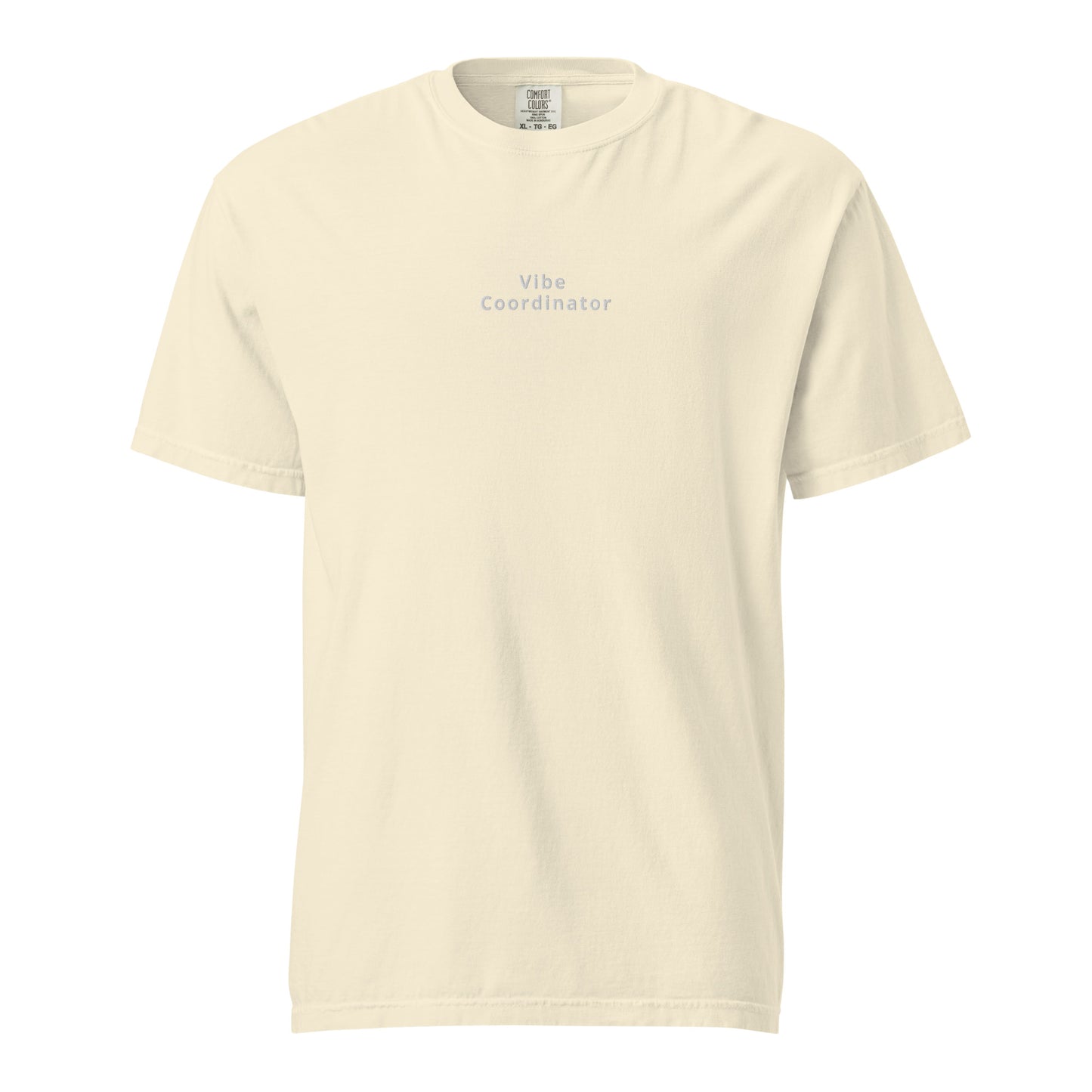 Product mockup with ivory shirt and white words saying vibe coordinator on white background